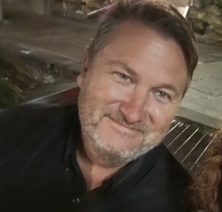 A photo of Jason's face while standing facing the camera